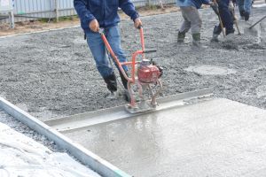 Concrete surface being floated and finished in Albemarle County