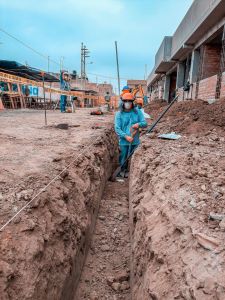 Excavated footing trench dug below the frost line