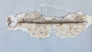 Spalling concrete surface in need of resurfacing
