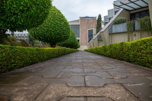 Stamped concrete walkway leading to a home entrance
